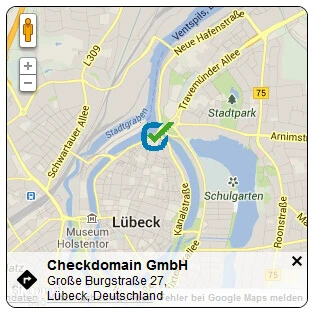 Kartenansicht von Lübeck, Deutschland mit blauem Marker und grünem Haken; Fluss, Brücken und Parkanlagen sichtbar.