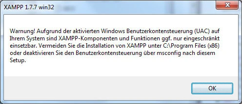 Windows-Warnung: Dialog mit Titel 'XAMPP 1.7.7 win32', gelbes Ausrufezeichen, Textblock, OK-Schaltfläche.
